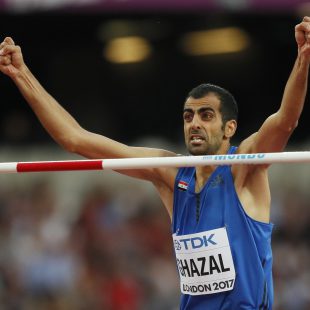 Syria's Majd Eddin Ghazal celebrates after an attempt in the men's high jump final during the World Athletics Championships in London Sunday, Aug. 13, 2017. (AP Photo/Kirsty Wigglesworth)